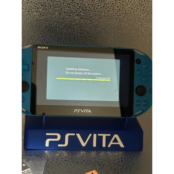 Blue ps vita 2000 w/charger - Picture 3 of 9